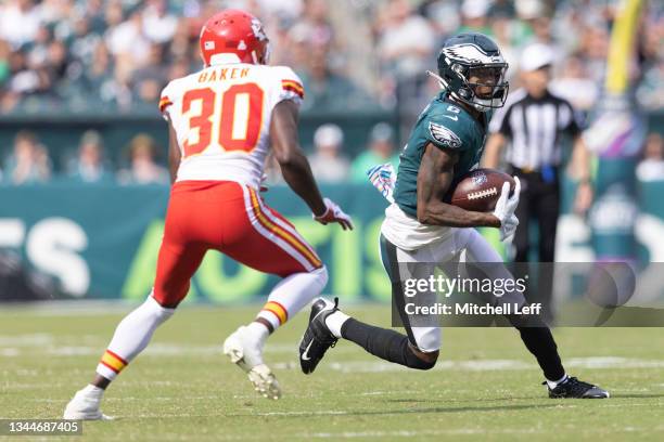 DeVonta Smith of the Philadelphia Eagles runs with the ball against DeAndre Baker of the Kansas City Chiefs at Lincoln Financial Field on October 3,...