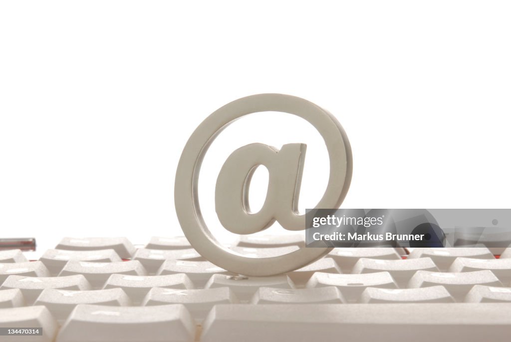 At Least Computer. Sign At Sign On A Computer Keyboard Symbolic Image For The Internet High-Res ...