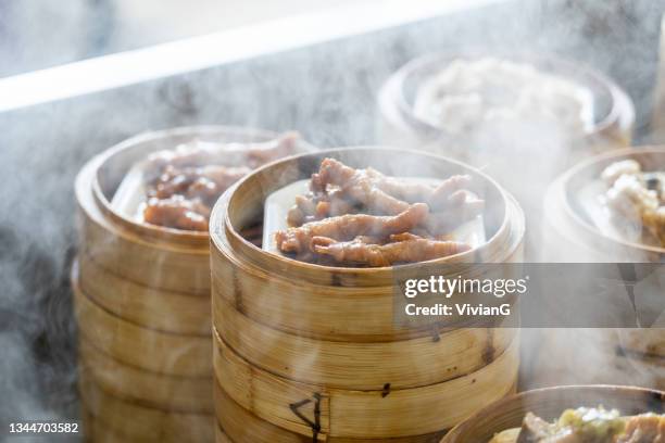 close-up of guangdong dum sum chicken feet in soy sauce in the restaurant - dim sum meal stock pictures, royalty-free photos & images