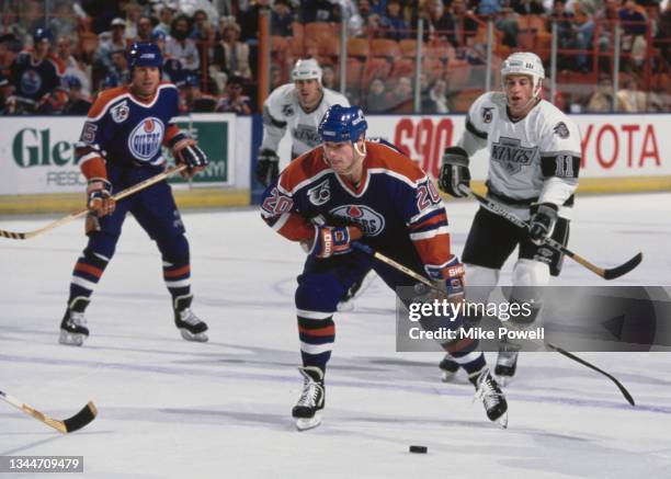 Martin Gelinas, Left Wing for the Edmonton Oilers in motion on the ice during the NHL Clarence Campbell Conference, Smythe Division game against the...