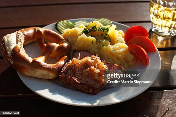 leberkaese spam with roasted onions, pretzels and potato salad, schwaben, bavaria, germany, europe - leberkäse stock pictures, royalty-free photos & images
