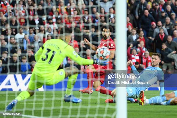 Mohamed Salah of Liverpool scores to make it 2-1 during the Premier League match between Liverpool and Manchester City at Anfield on October 03, 2021...