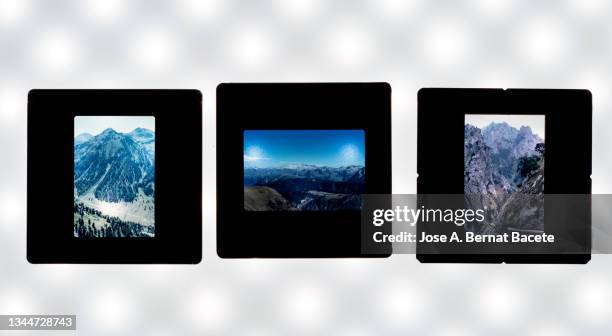 close-up of photographic slides on a white background. - film collector stock pictures, royalty-free photos & images