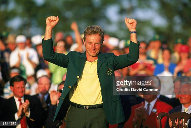 Bernhard Langer of Germany celebrates after receiving the green jacket for winning the US Masters at the Augusta National Golf Club in Augusta,...