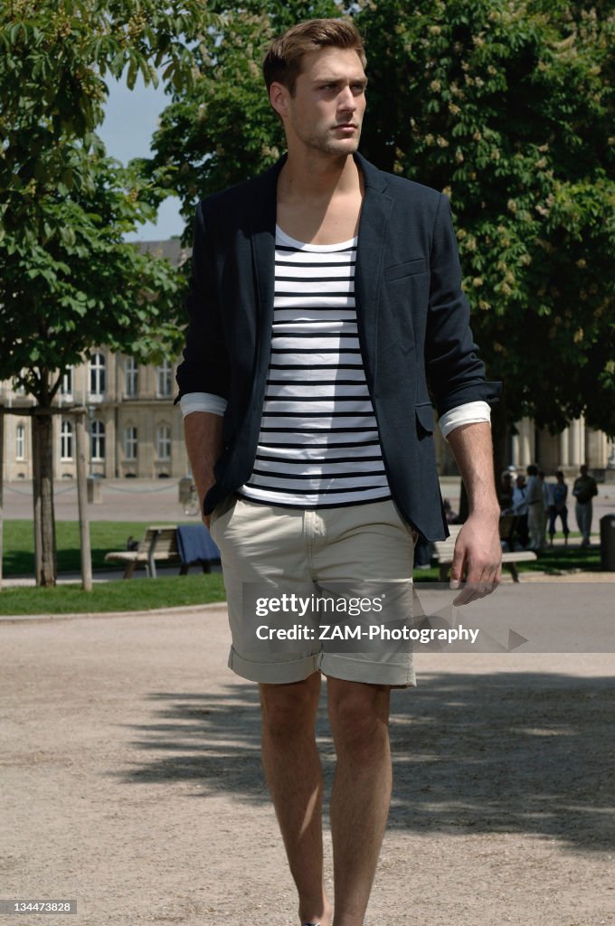Man in shorts in the city
