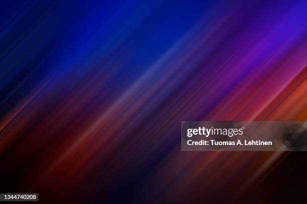 soft and tilted red and blue lines with motion blur, vibrant background. - 斜めから見た図 ストックフォトと画像