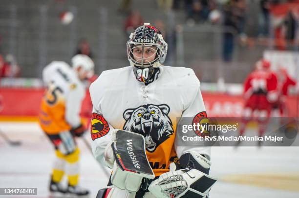 Goalie Philip Wuthrich of SC Bern warms up prior the Swiss National League game between Lausanne HC and SC Bern at Vaudoise Arena on September 28,...