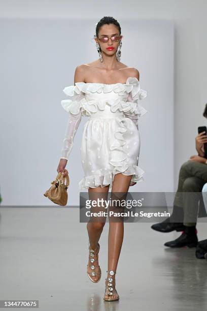 Model walks the runway during the Giambattista Valli Womenswear Spring/Summer 2022 show as part of Paris Fashion Week on October 04, 2021 in Paris,...