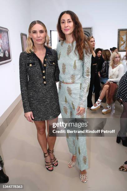 Lilou Fogli and Bianca Lee Vasquez attend the Giambattista Valli Womenswear Spring/Summer 2022 show as part of Paris Fashion Week on October 04, 2021...
