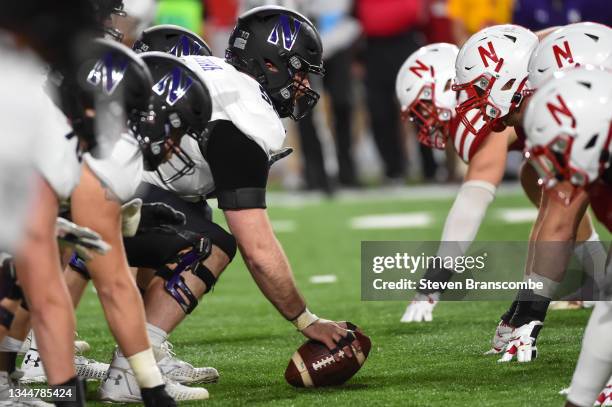 Offensive lineman Sam Gerak of the Northwestern Wildcats prepares to snap the football against the Nebraska Cornhuskers in the second half at...