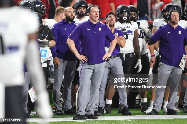 Head coach Pat Fitzgerald of the Northwestern Wildcats watches action against the Nebraska Cornhuskers in the first half at Memorial Stadium on...