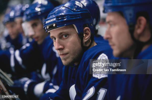 Adam Mair from Canada and Center for the Toronto Maple Leafs looks on from the bench during the NHL Pre Season game against the Calgary Flames on...