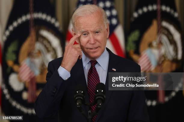 President Joe Biden delivers remarks about the need for Congress to raise the debt limit in the State Dining Room at the White House on October 04,...