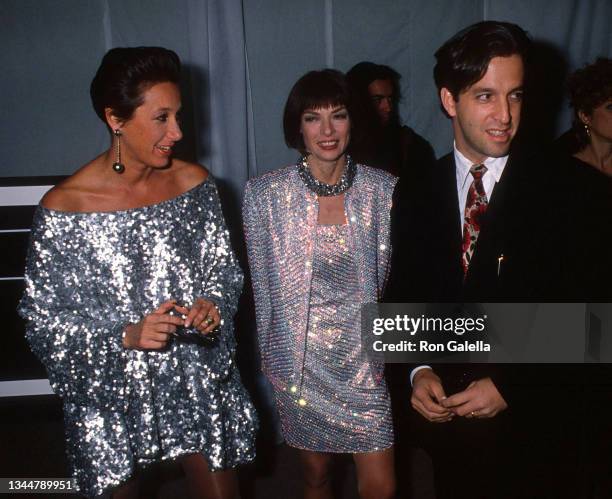 From left, American fashion designer Donna Karan, British-American editor & journalist Anna Wintour, and fashion designer Kenneth Cole attend the...