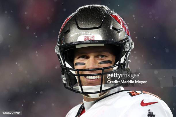 Tom Brady of the Tampa Bay Buccaneers smiles before the game between the New England Patriots and the Tampa Bay Buccaneers at Gillette Stadium on...