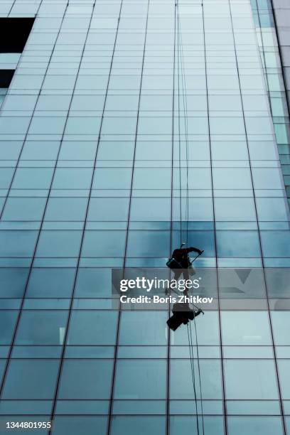 window cleaner. - glass magazine stock-fotos und bilder