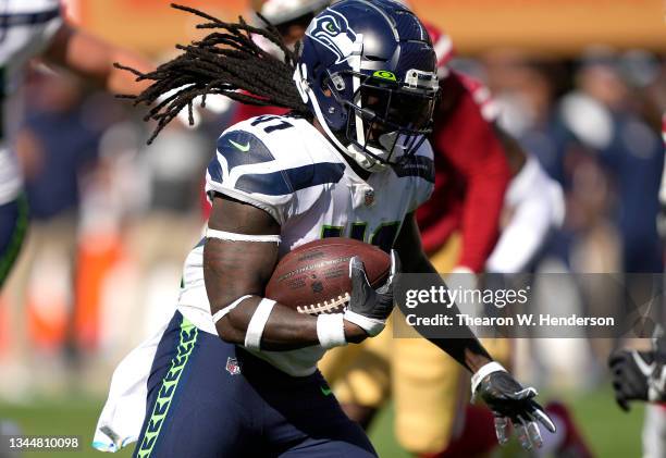 Alex Collins of the Seattle Seahawks runs the ball for a touchdown during the fourth quarter against the San Francisco 49ers at Levi's Stadium on...