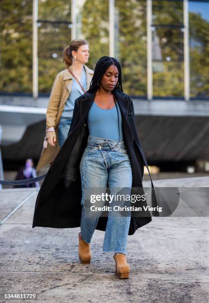Guest is seen wearing denim jeans outside Stella McCartney during Paris Fashion Week - Womenswear Spring Summer 2022 on October 04, 2021 in Paris,...