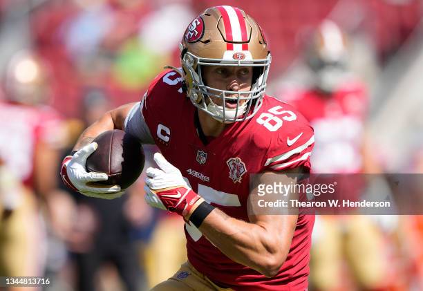 George Kittle of the San Francisco 49ers warms up during pregame prior to the start of the game against the Seattle Seahawks at Levi's Stadium on...