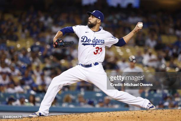 David Price of the Los Angeles Dodgers pitches against the Milwaukee Brewers during the ninth inning at Dodger Stadium on October 02, 2021 in Los...