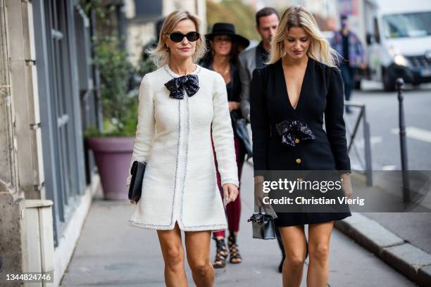 Guests seen outside Giambattista Valli during Paris Fashion Week - Womenswear Spring Summer 2022 on October 04, 2021 in Paris, France.