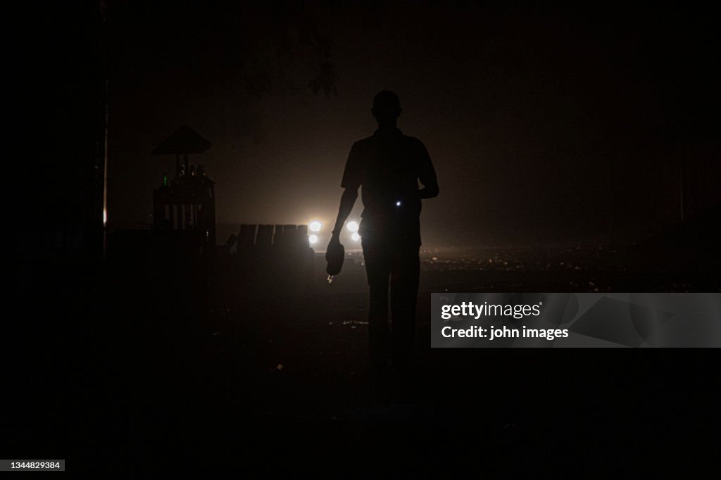 A man in the street during the load shedding