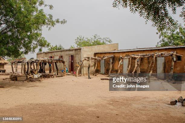 the family yard of a family - african village stock-fotos und bilder