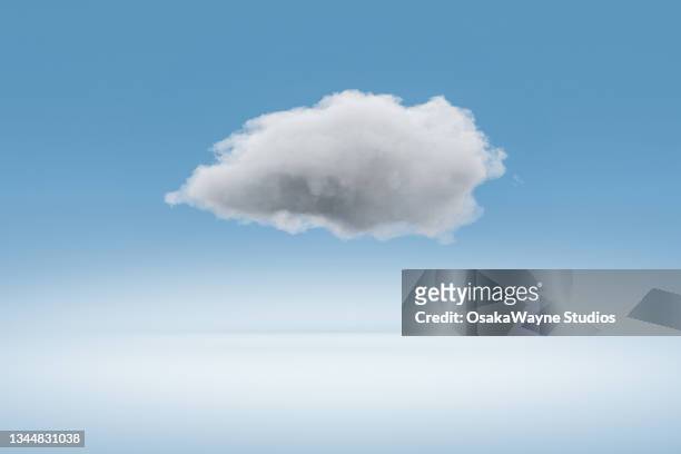 fluffy cloud against white and blue gradient background - nube fotografías e imágenes de stock