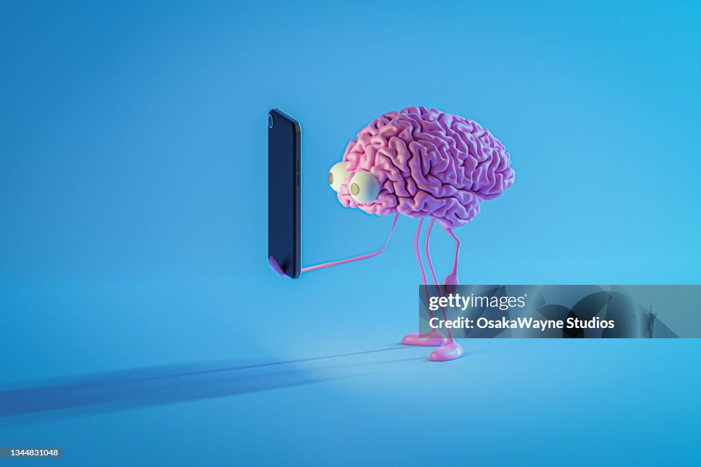 Pink brain looking at smartphone screen
