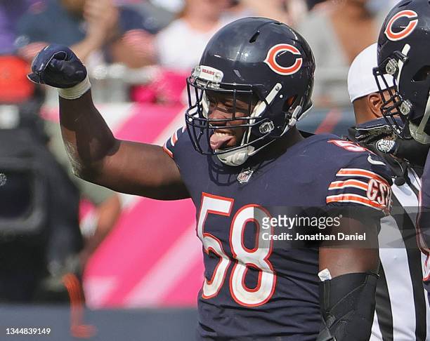 Roquan Smith of the Chicago Bears celebrates a sack against the Detroit Lions at Soldier Field on October 03, 2021 in Chicago, Illinois. The Bears...