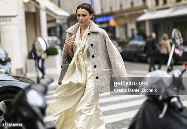 Mary Leest is seen wearing a Fendi dress, Fendi bag with a Zadig & Voltaire coat during Paris Fashion Week S/S 2022 on October 04, 2021 in Paris,...