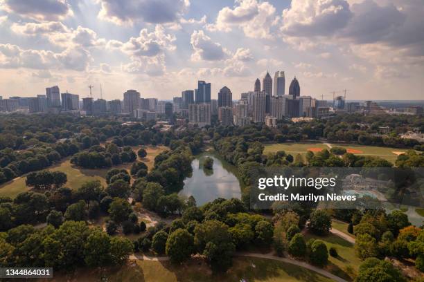 aerial view of piedmont park with atlanta skyline - atlanta skyline aerial stock pictures, royalty-free photos & images