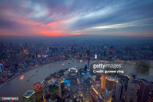 panoramic skyline of shanghai - huangpu fluss stock-fotos und bilder
