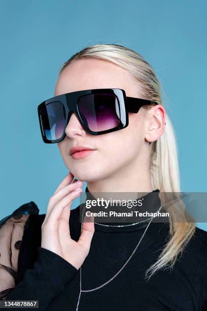 stylish woman in black outfit - big cool attitude stock pictures, royalty-free photos & images