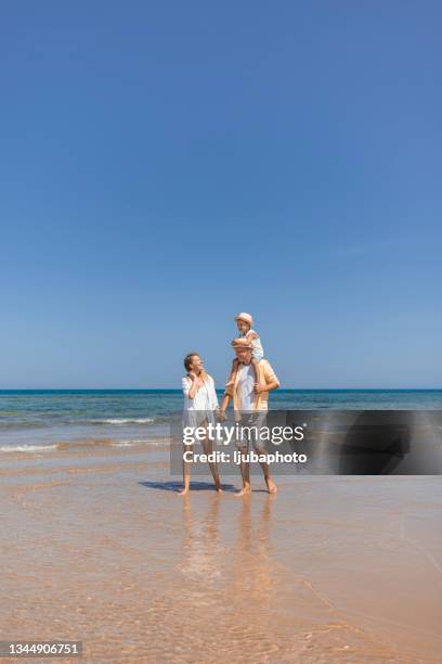 bring your favourite people to the beach, family. - egypt beach stock pictures, royalty-free photos & images