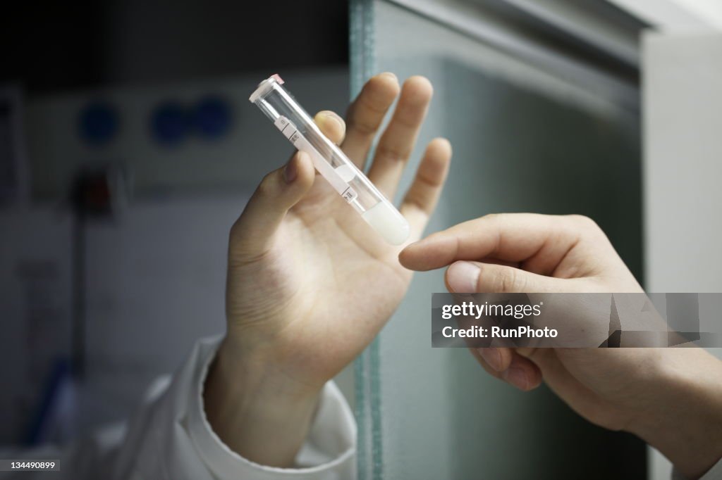 Hands with tube,close-up,hospital