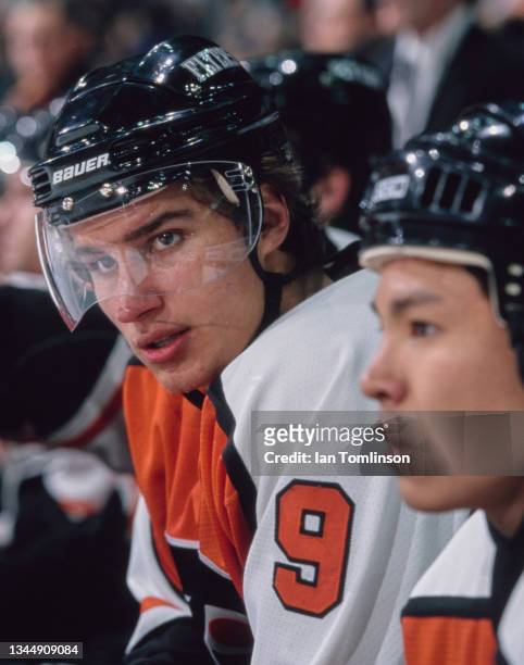 Dainius Zubrus from Russia and Right Wing for the Philadelphia Flyers looks on from the team bench during the NHL Western Conference Northwest...