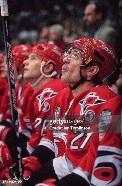 Ron Francis from Canada, Captain and Center for the Carolina Hurricanes looks up from the team bench during the NHL Western Conference Northwest...