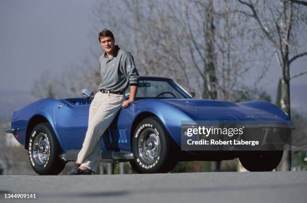 Teemu Selanne from Finland and Right Wing for the Mighty Ducks of Anaheim poses for a photograph with his 1968 Chevrolet Corvette Convertible on 27th...