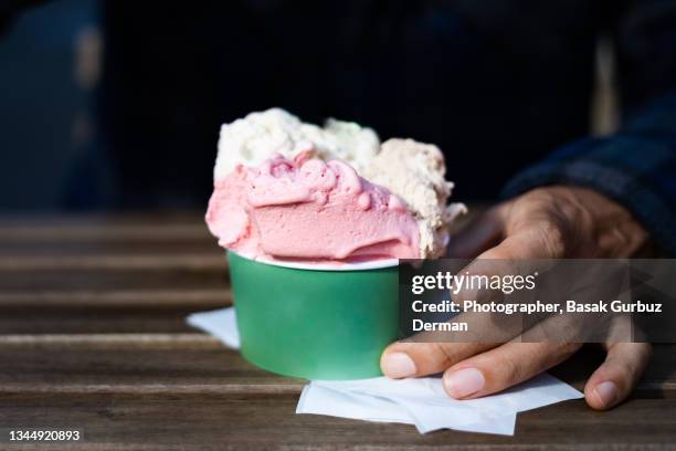 a man eating ice cream - gelato stock pictures, royalty-free photos & images