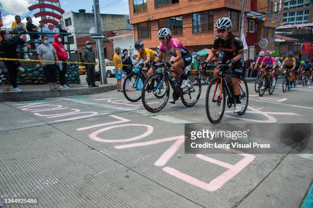 Myriam Nunez disputes first place at the rise of the neighborhood La Perseverancia during the last stage finals of the Vuelta a Colombia Femenina...