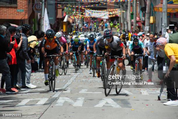 People of La Perseverancia neighborhood support cyclists during the last stage finals of the Vuelta a Colombia Femenina 2021 in Bogota, Colombia,...