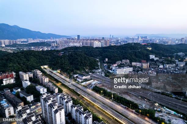 aerial view of viaduct road traffic landscape passing through the cave - cave junction stock pictures, royalty-free photos & images