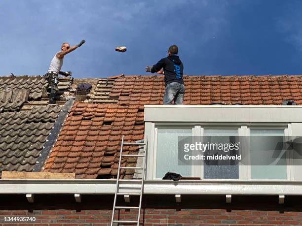 demolishing a brick chimney - aiming higher stock pictures, royalty-free photos & images