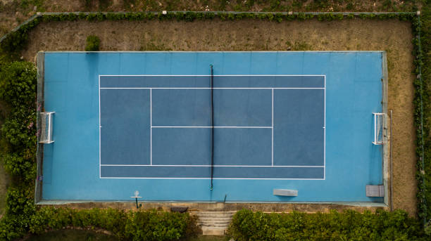 aerial photo looking directly down on a tennis court in cascais, portugal - tennis stock pictures, royalty-free photos & images
