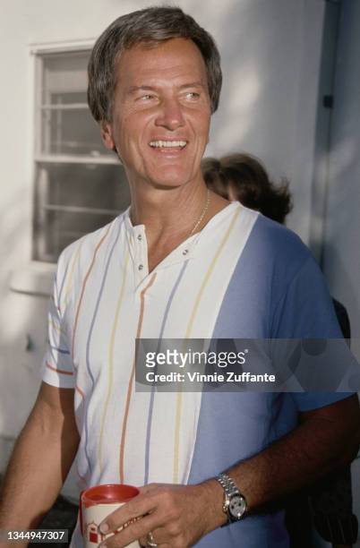 American singer and actor Pat Boone at an event for earth Day, circa 1995.