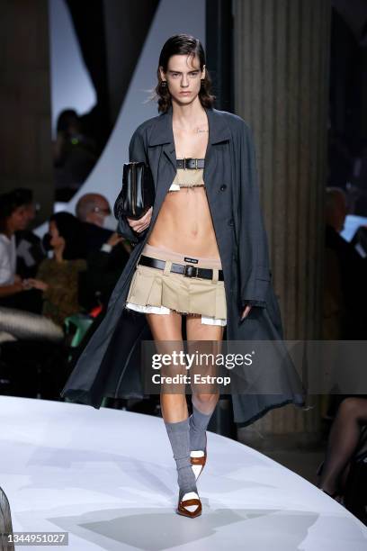 Model walks the runway during the Miu Miu Womenswear Spring/Summer 2022 show as part of Paris Fashion Week on October 05, 2021 in Paris, France.