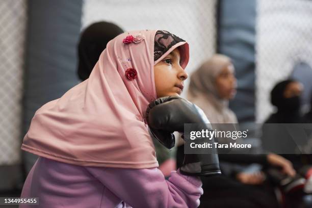 young girls with boxing gloves - femalefocuscollection stock pictures, royalty-free photos & images