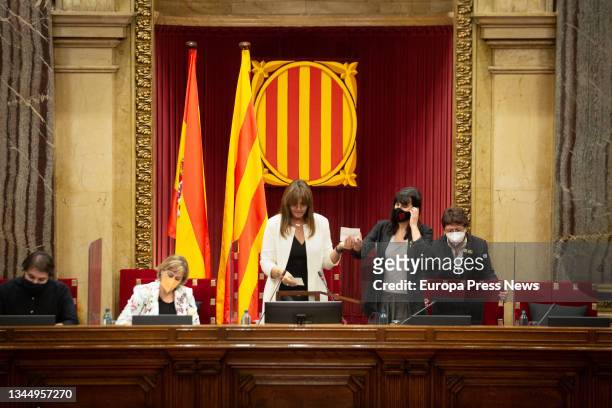 The president of the Parliament, Laura Borras , performs the vote count to elect the new second vice president of the Parliament, during a session in...
