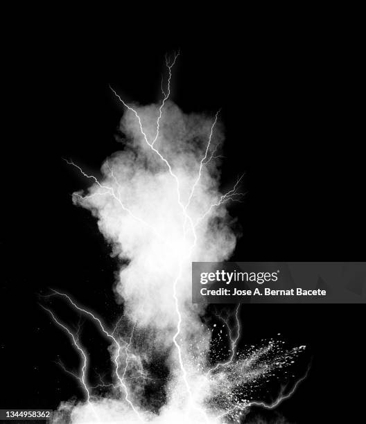 electric explosion of smoke and fire with lightning on a black background - volcanic activity fotografías e imágenes de stock